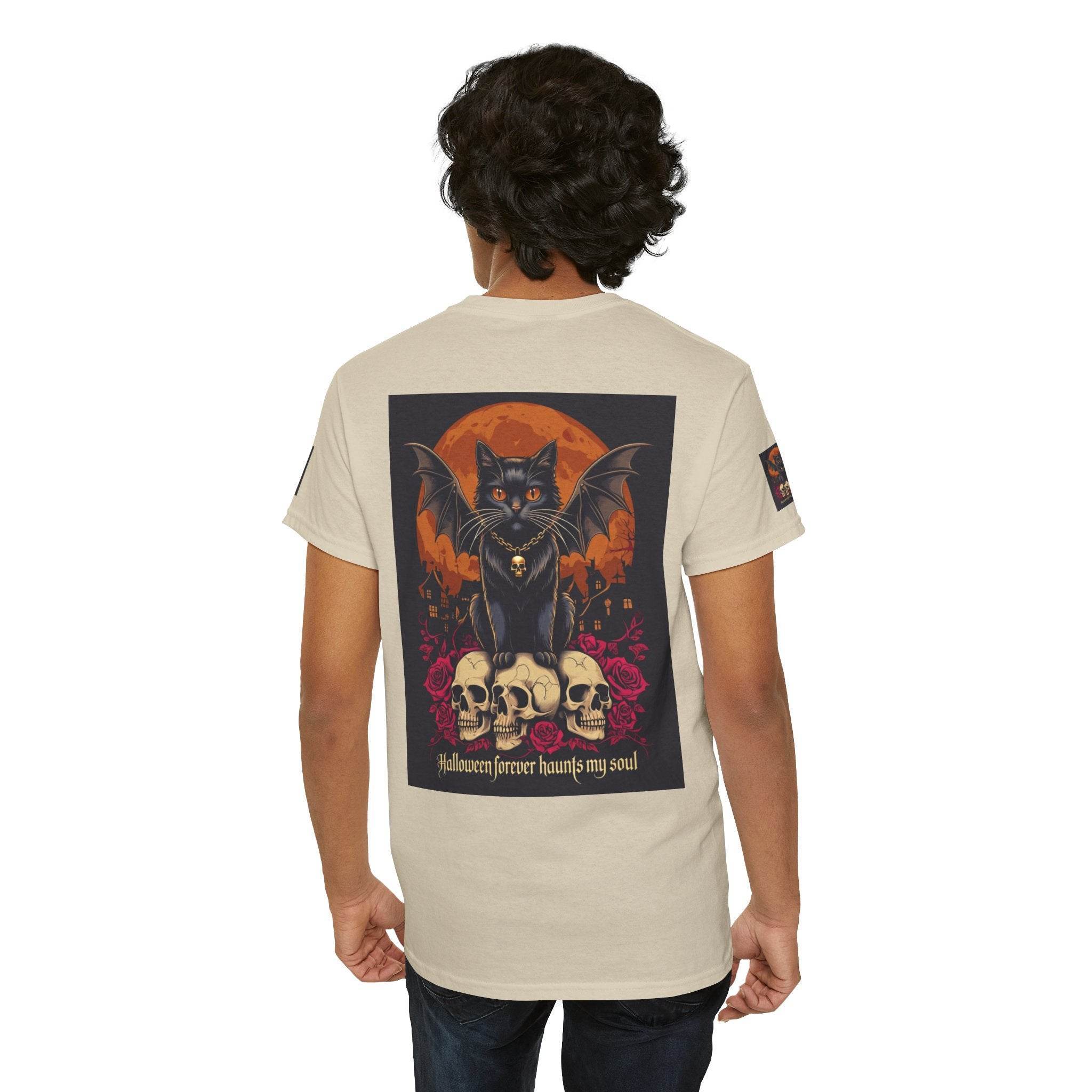 Printify eco-friendly Halloween cat shirt beige tee with winged black cat on skulls and orange moon back graphic