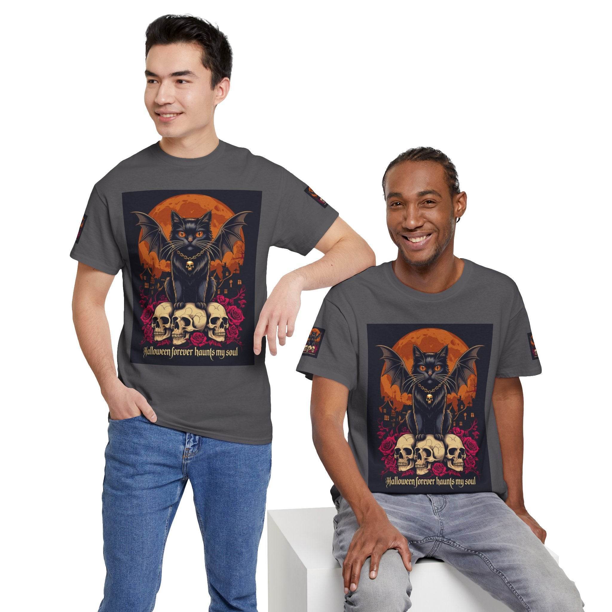 Printify T shirts featuring eco-friendly Halloween cat shirt design of a bat winged black cat over skulls and an orange moon