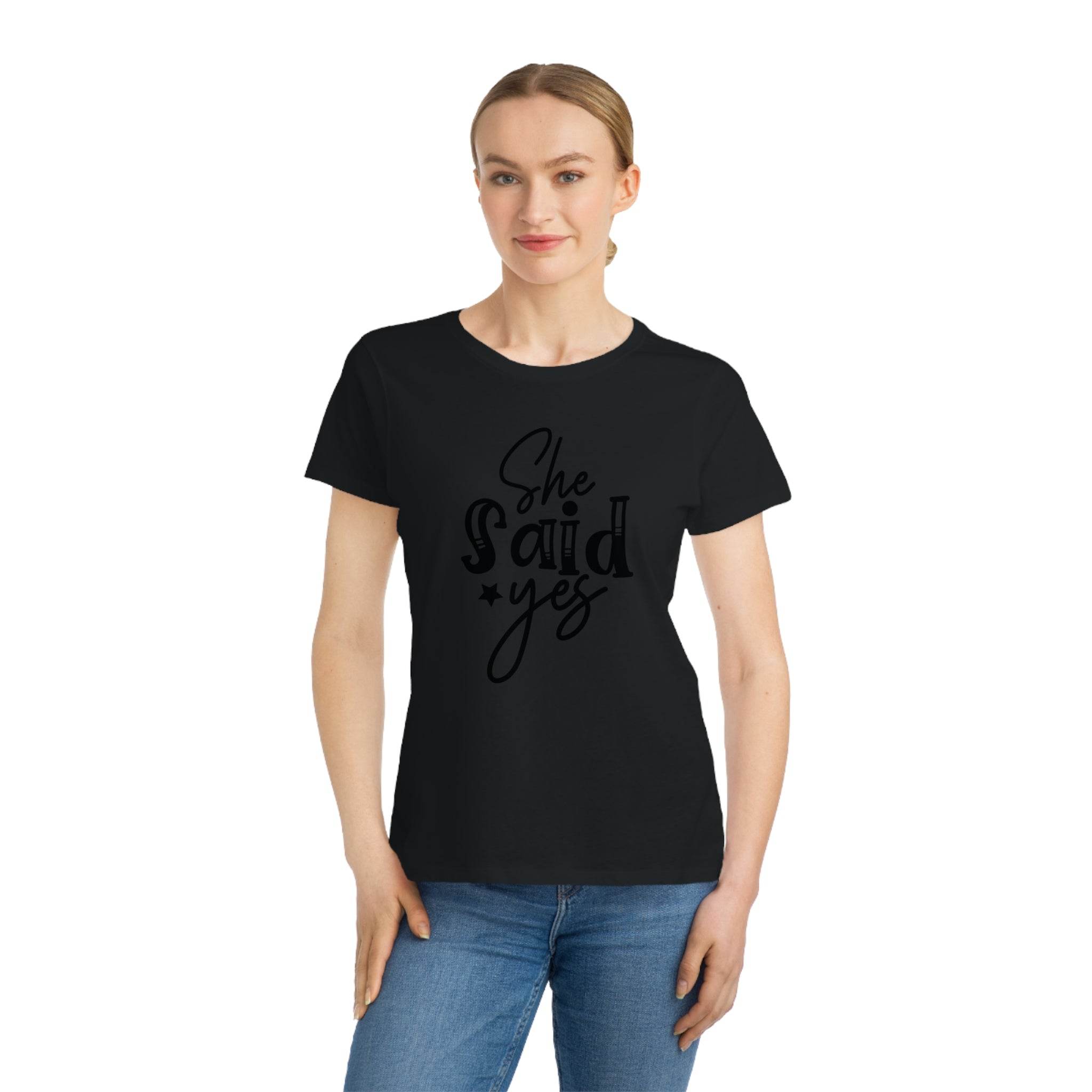 Printify model wearing black eco-friendly women's engagement shirt with She Said Yes script design crewneck