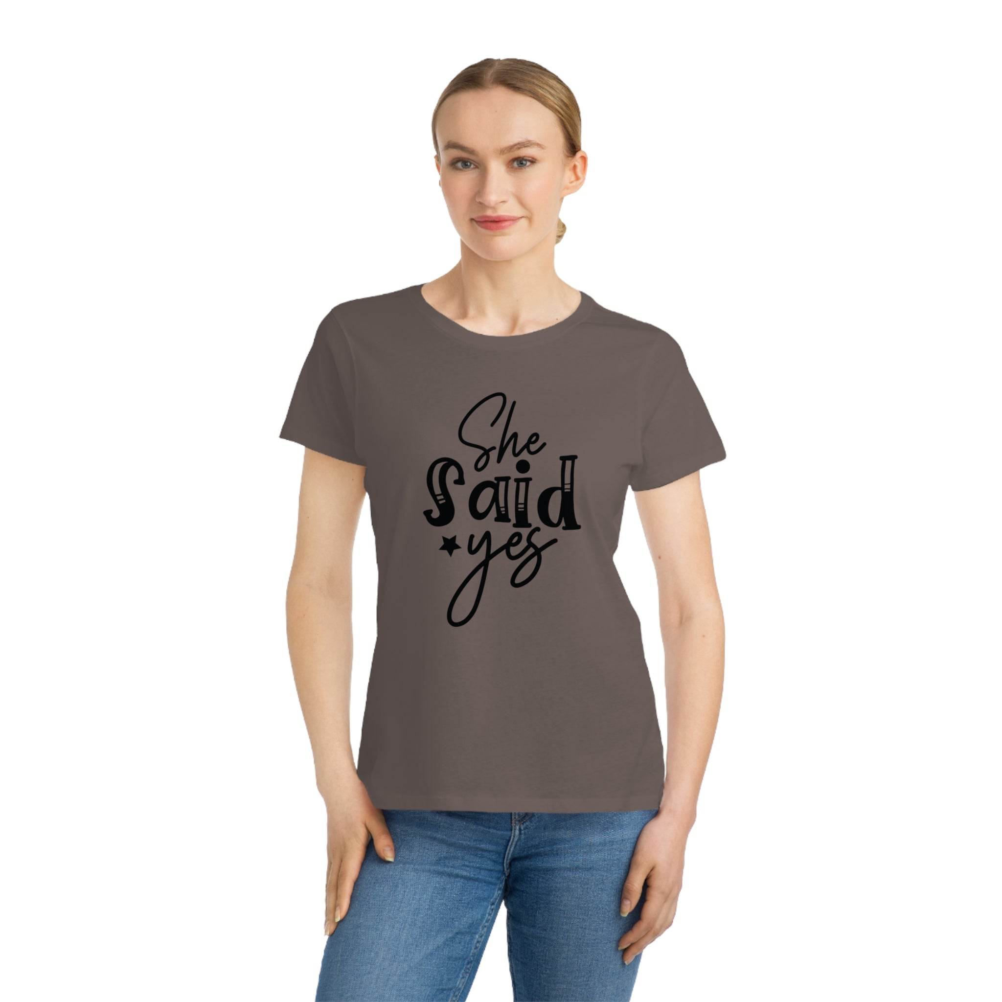 Printify eco-friendly women's engagement shirt modeled in brown with She said yes script design on front