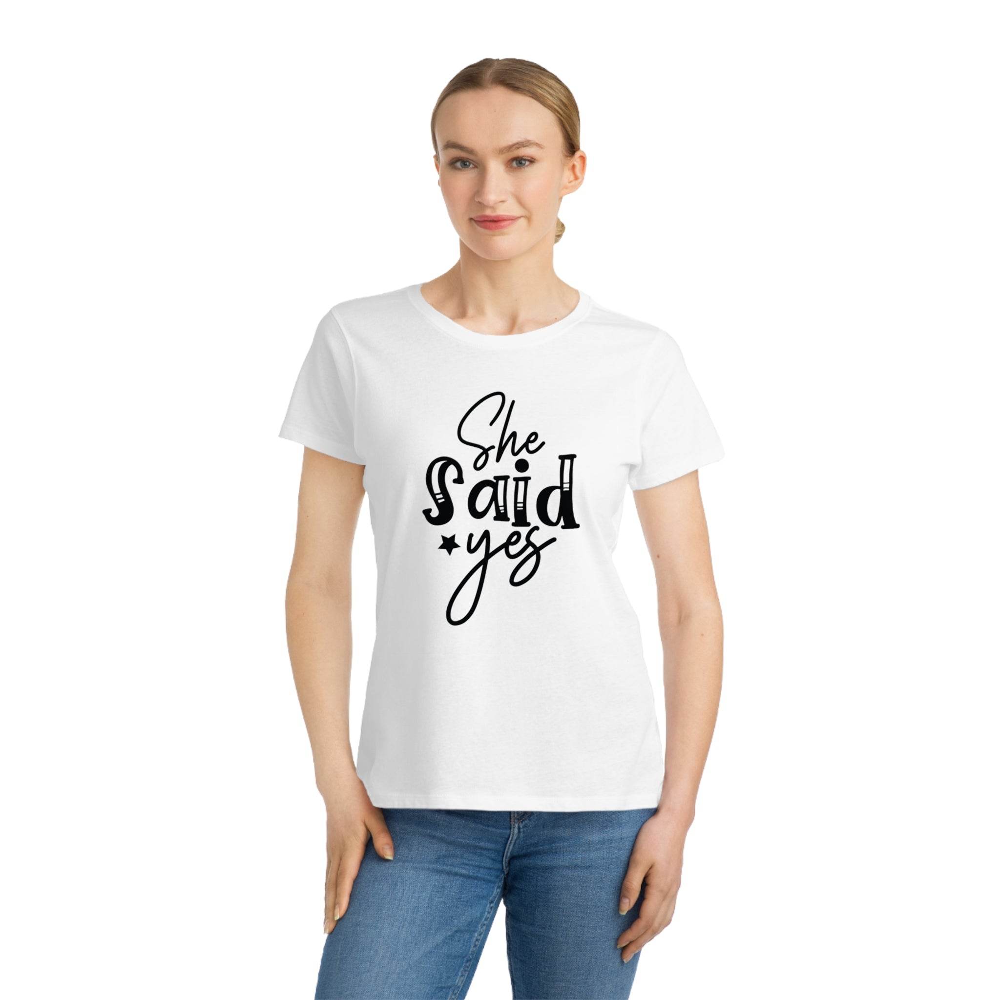 Printify white tee on model with She Said Yes script print eco-friendly women's engagement shirt