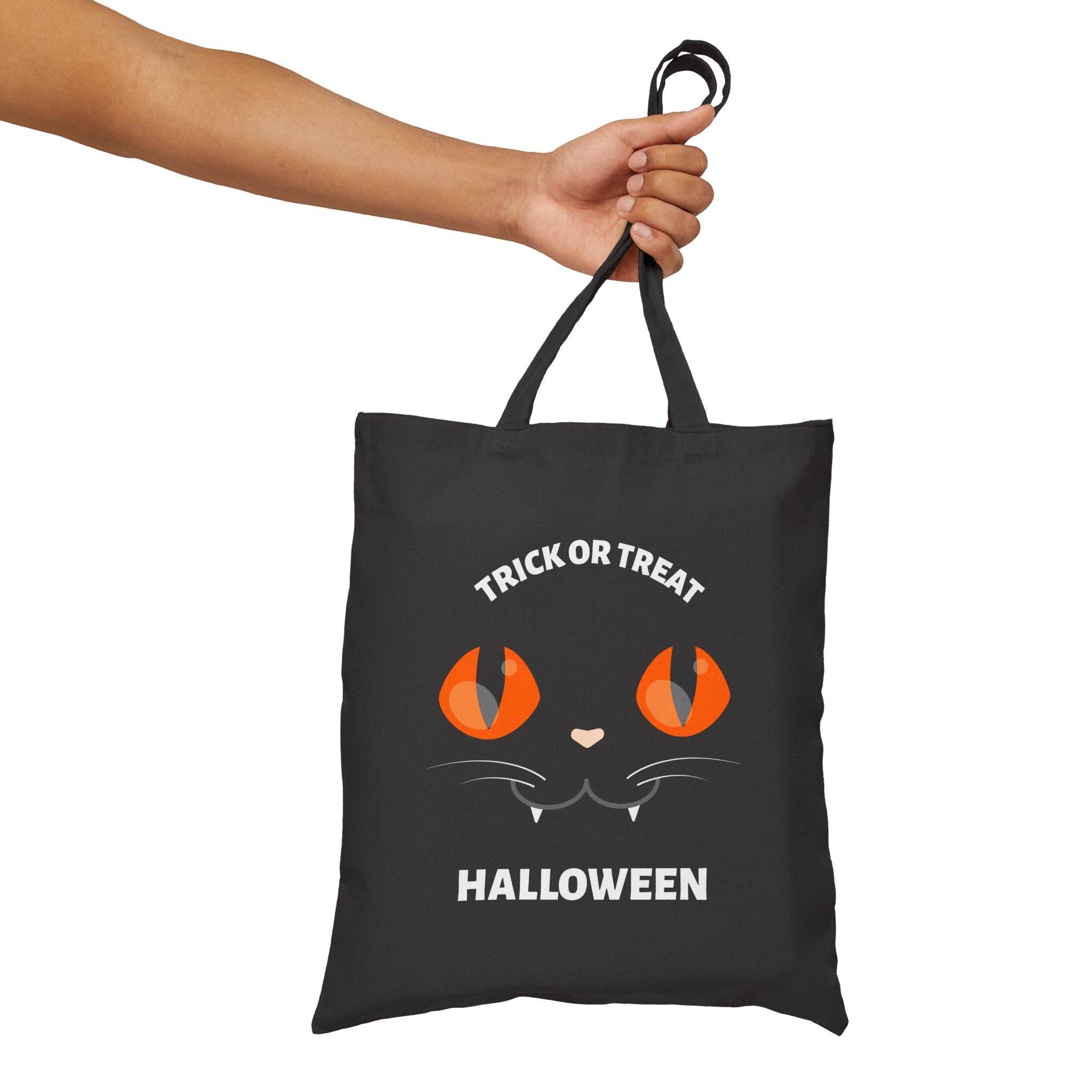 Printify eco-friendly Halloween tote bag with black cat face and Trick or Treat text