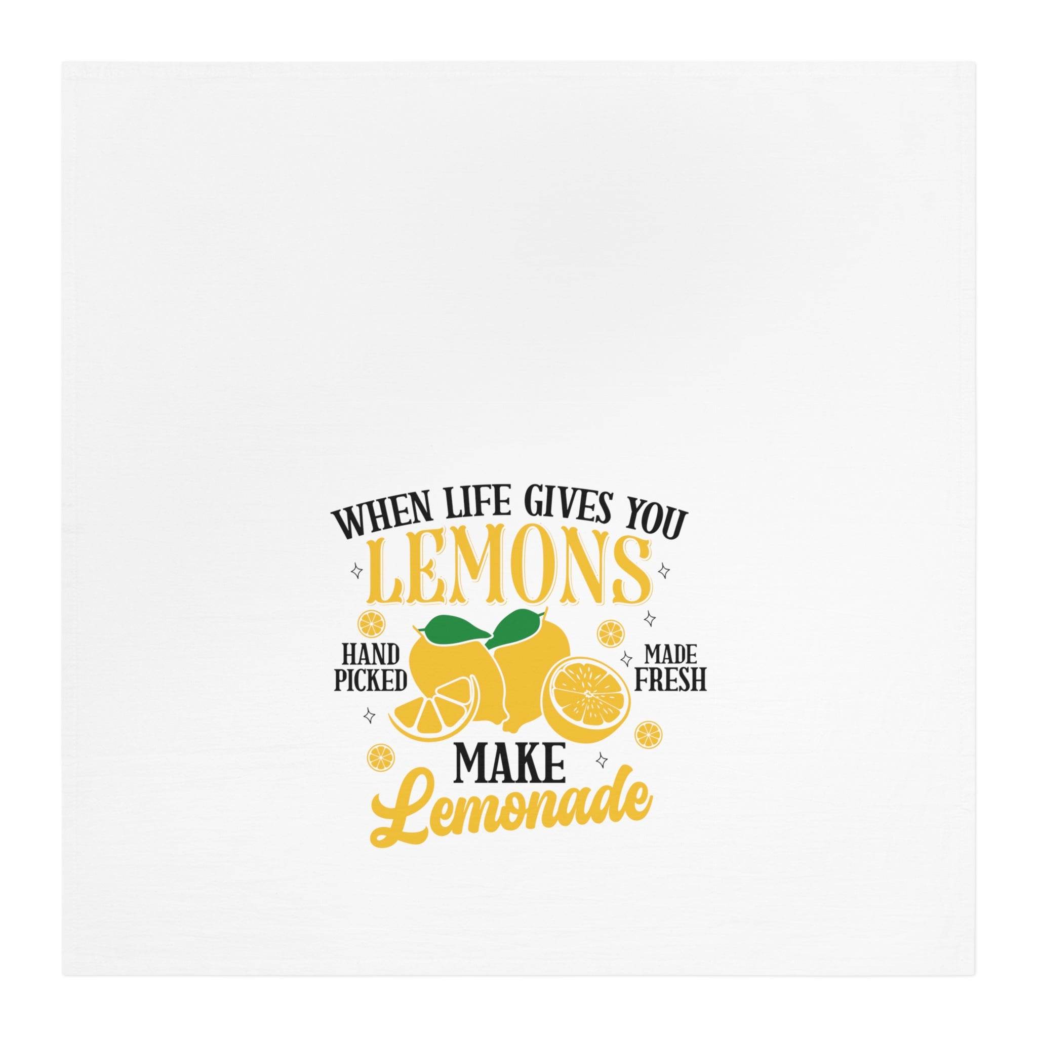 White lemonade themed tea towel with yellow lemons and quote when life gives you lemons