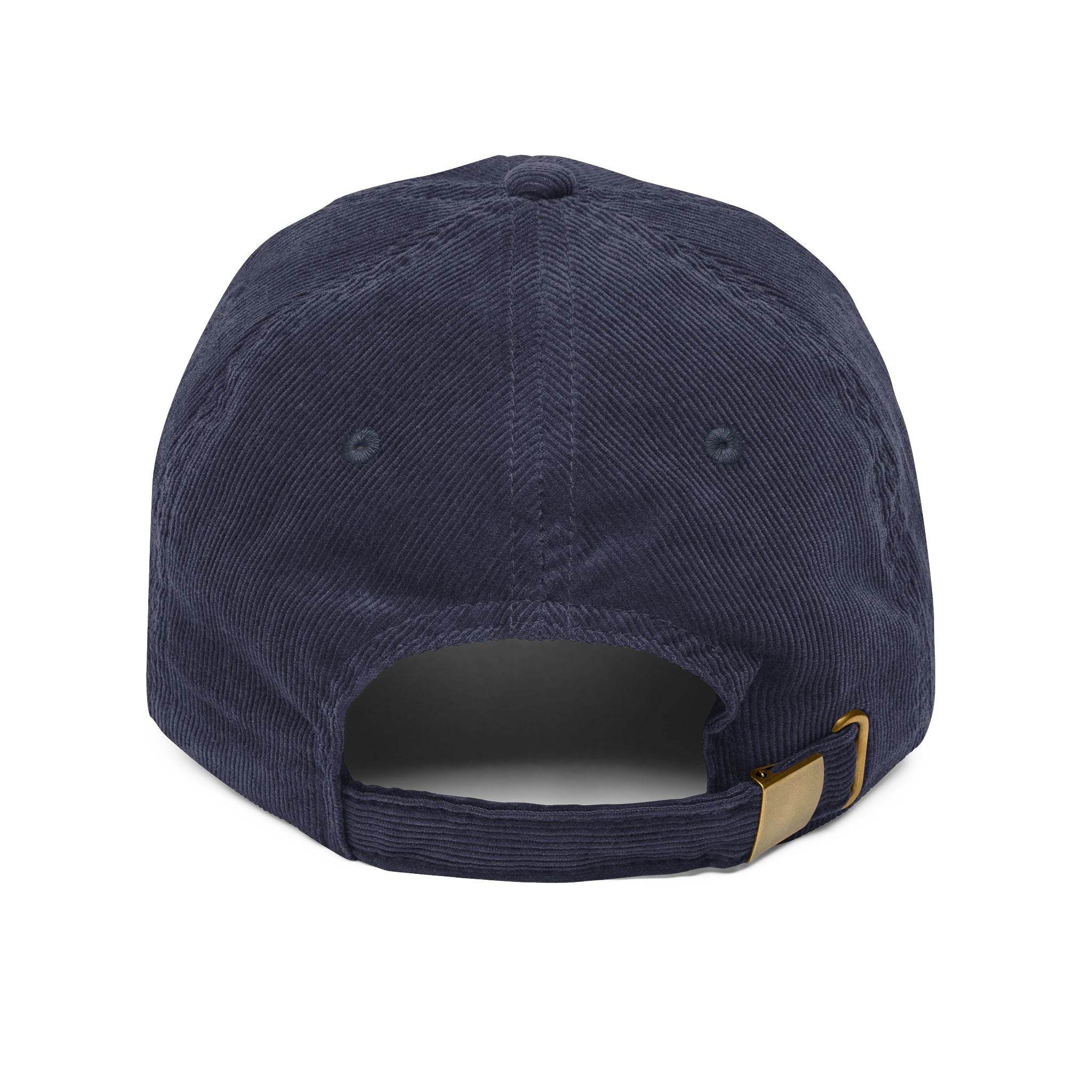 Back view of navy blue vintage corduroy cap with adjustable strap and metal buckle