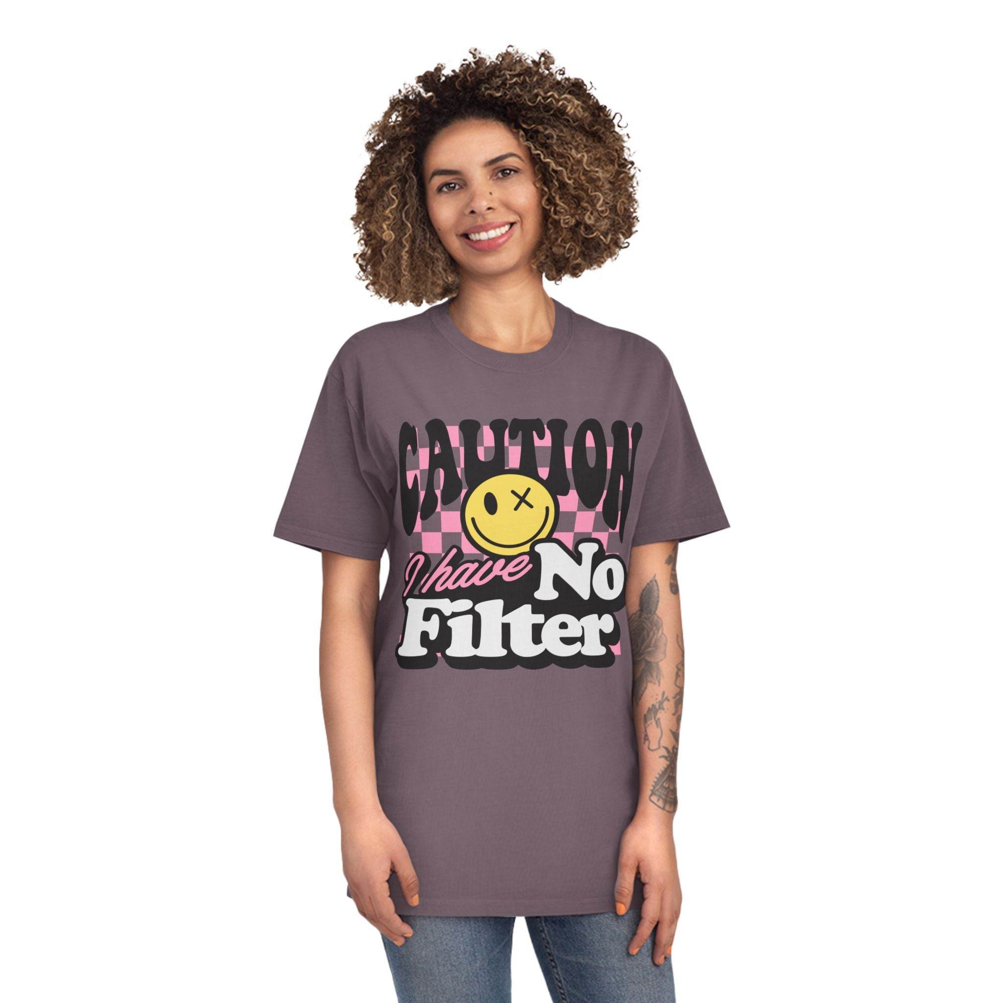 Printify eco-friendly unisex faded shirt with caution graphic and no filter text worn by smiling model