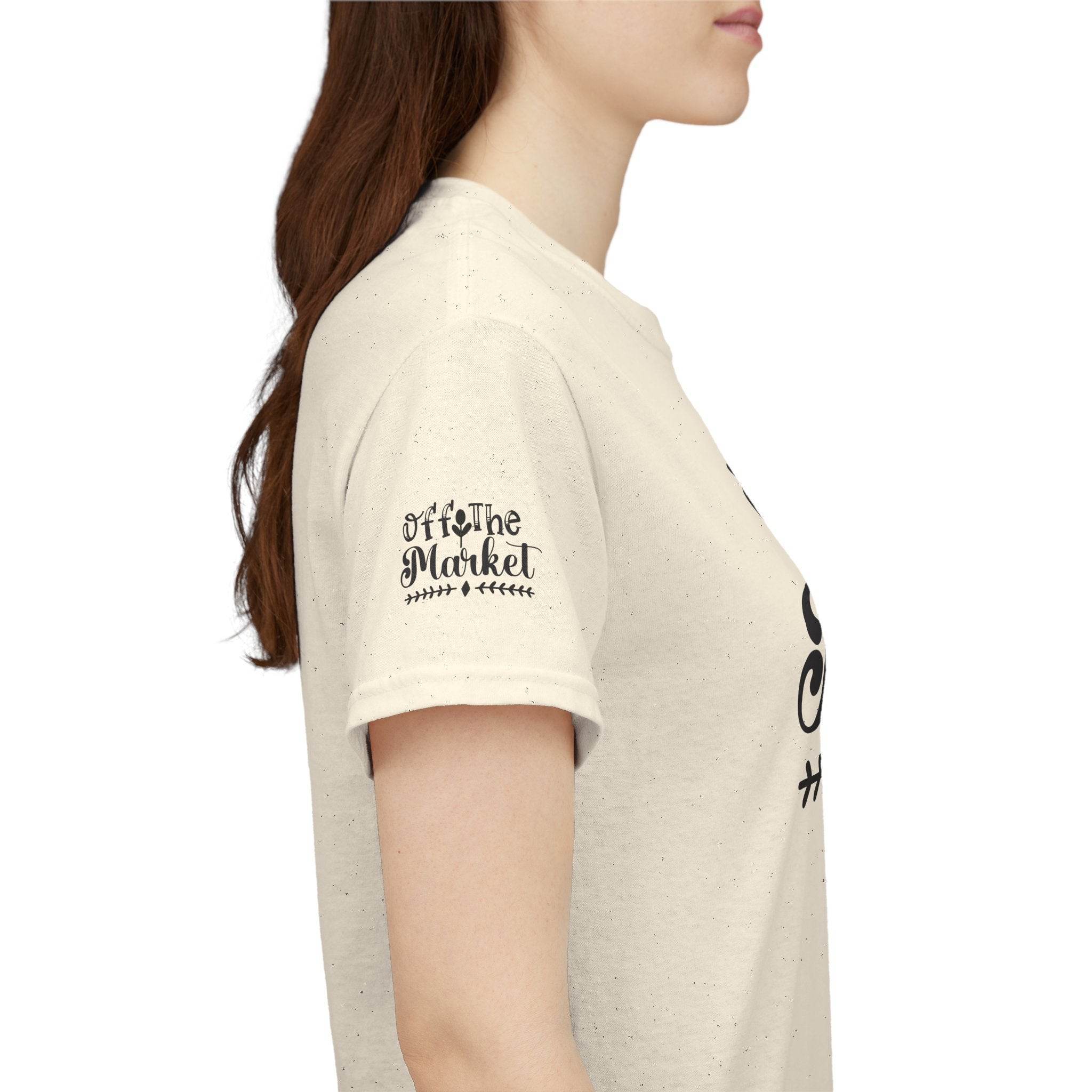 Printify eco-friendly unisex t-shirt natural speckled beige side view showing Off the Market sleeve print on model