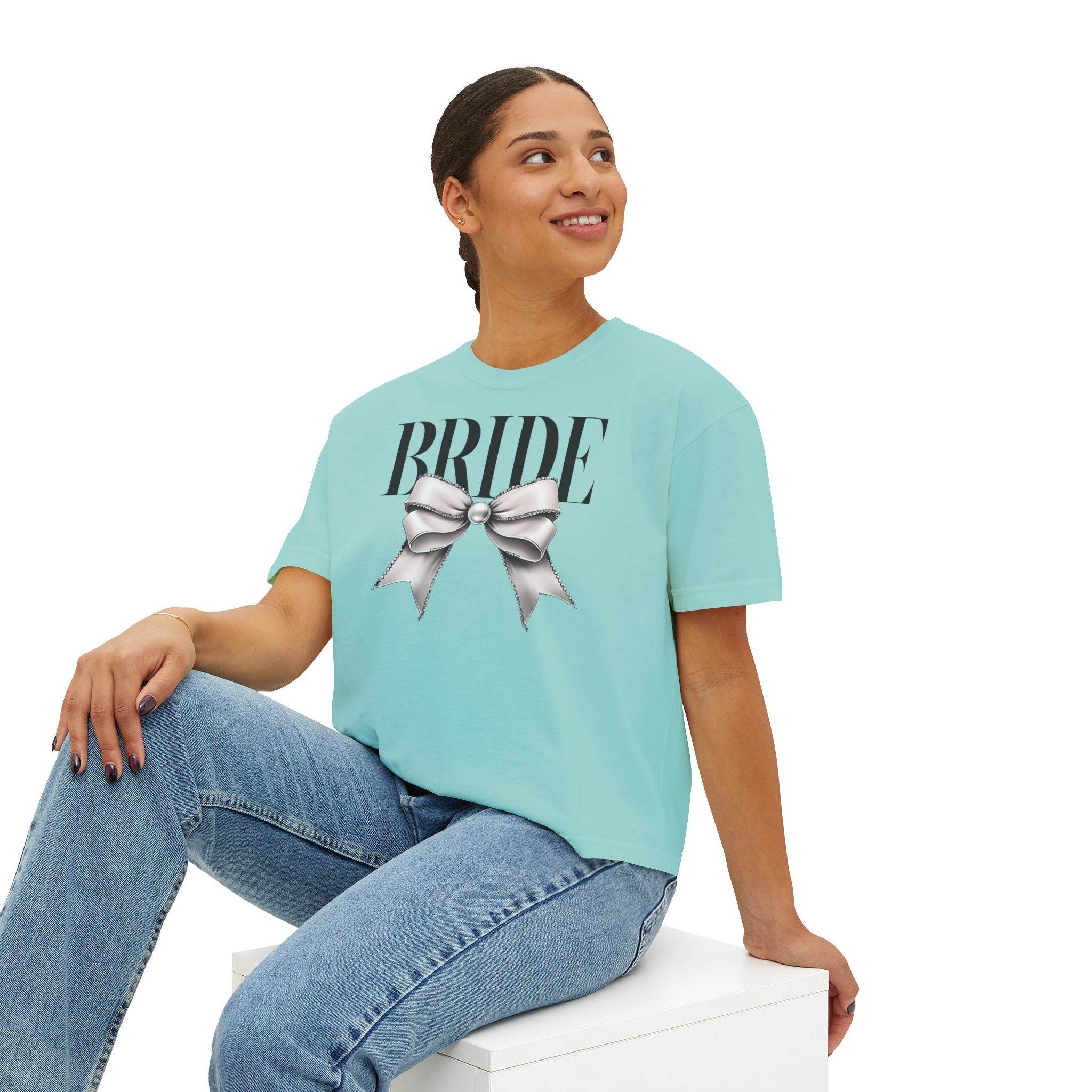 Printify eco-friendly bridal t-shirt mint green BRIDE graphic with silver bow worn with jeans