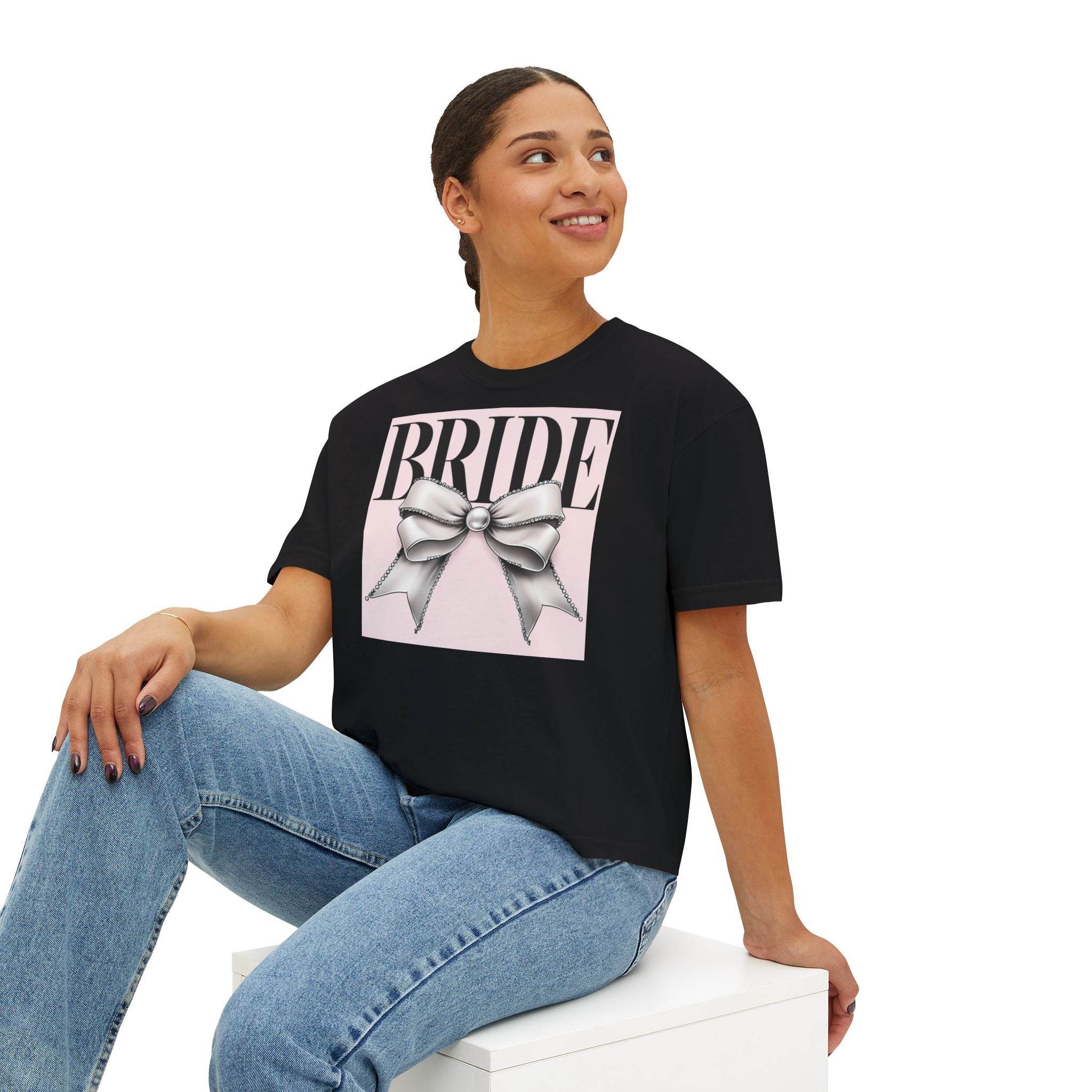 Printify eco-friendly bridal t-shirt black with BRIDE text and silver bow graphic worn by smiling woman model