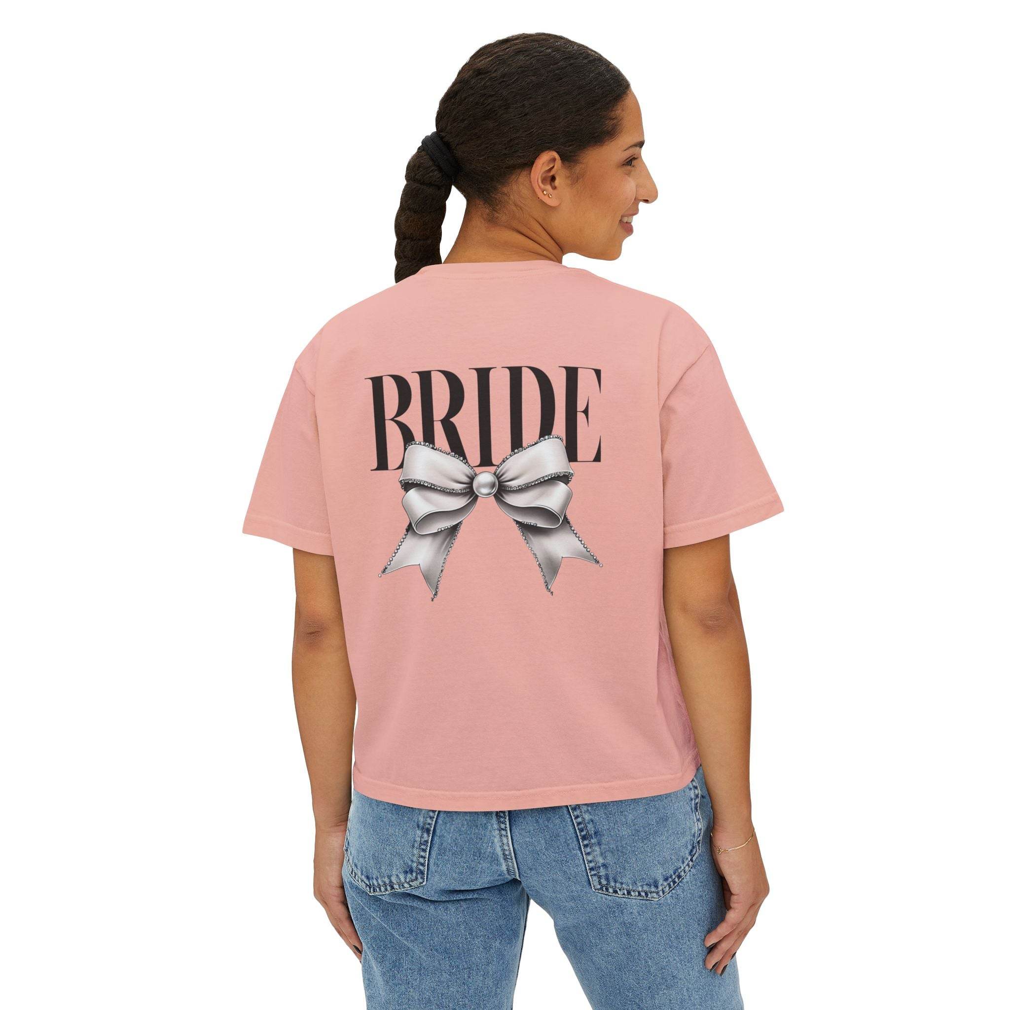 Printify pink cropped eco-friendly bridal t-shirt with BRIDE lettering and silver bow graphic on back