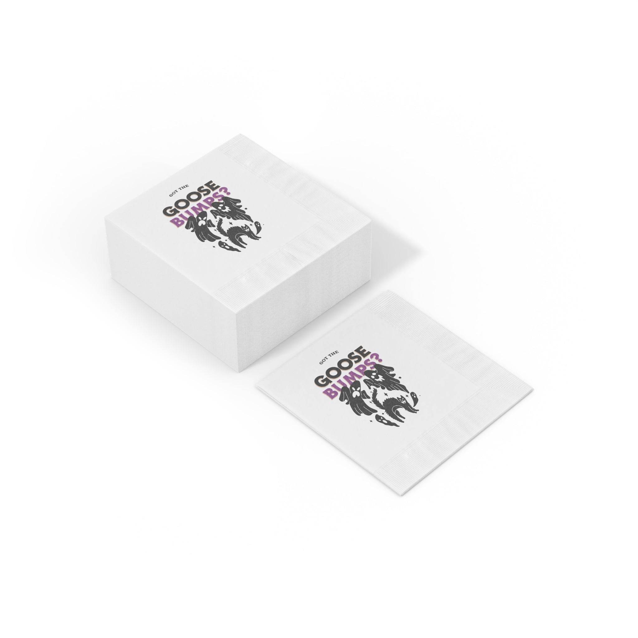 Printify eco-friendly Halloween napkins with black and purple goose graphic shown stacked and flat for party use