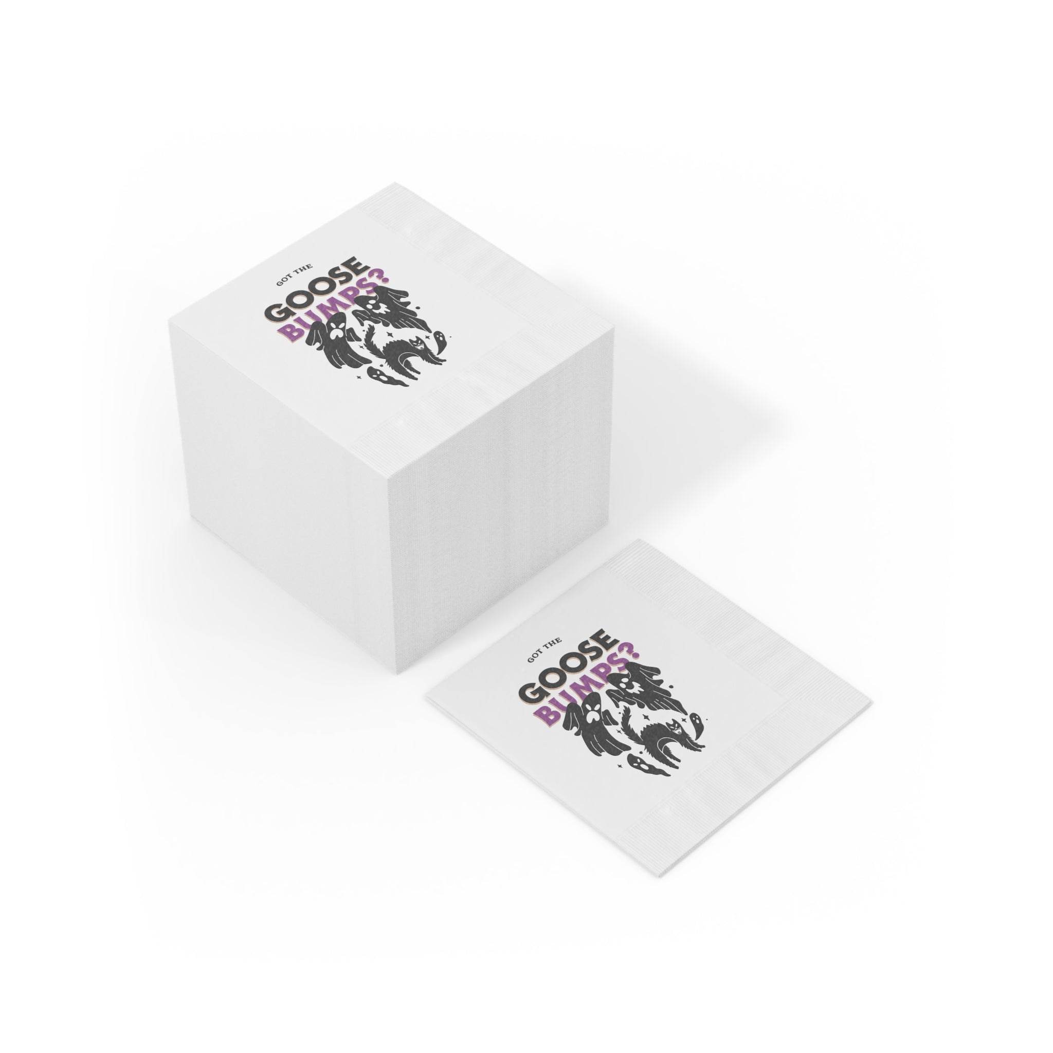 Stack of white square napkins printed with a spooky goose illustration and purple GOOSE BUMPS text eco-friendly Halloween napkins