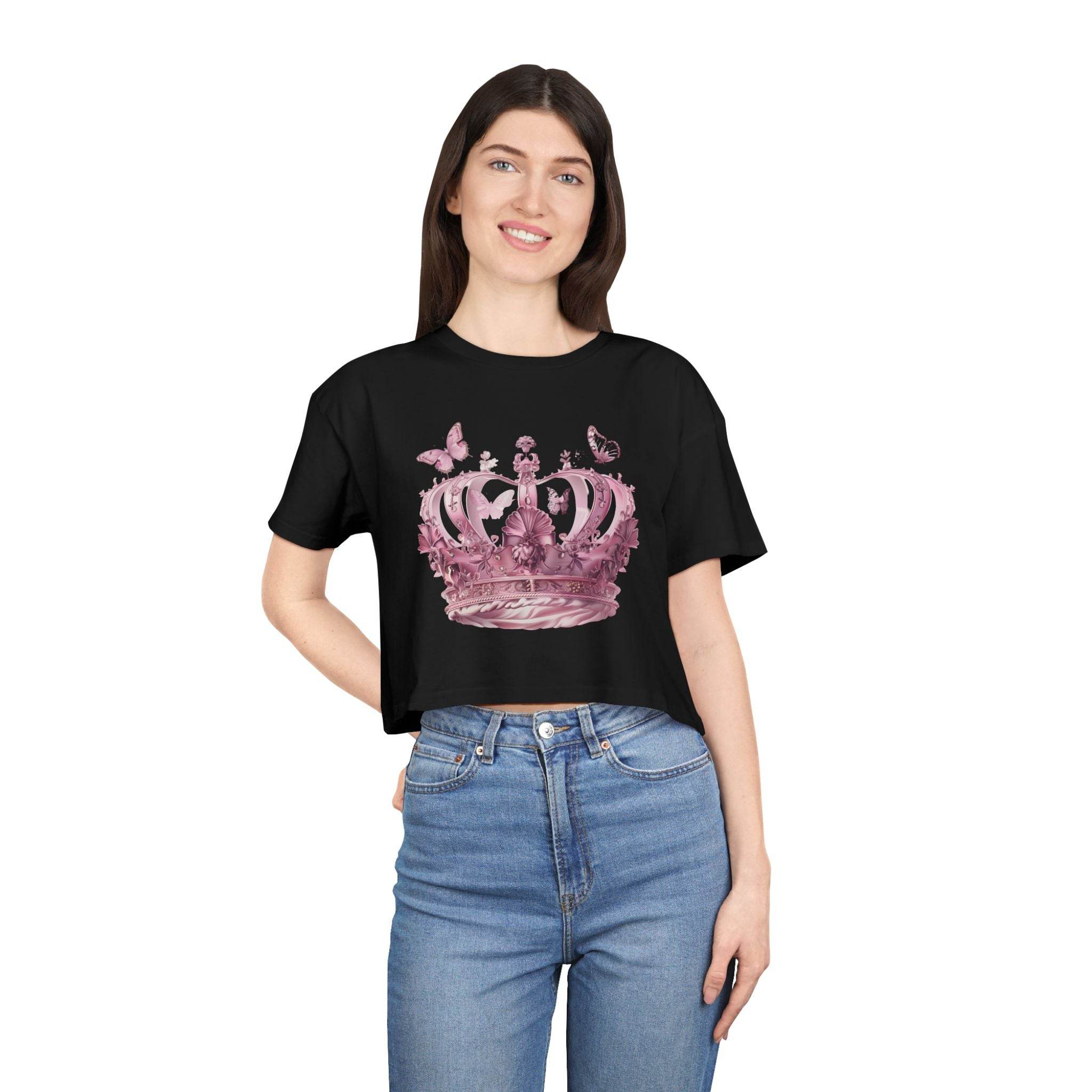 Woman wearing a black Petal & Crown eco crop shirt with a pink crown and butterfly design from Printify