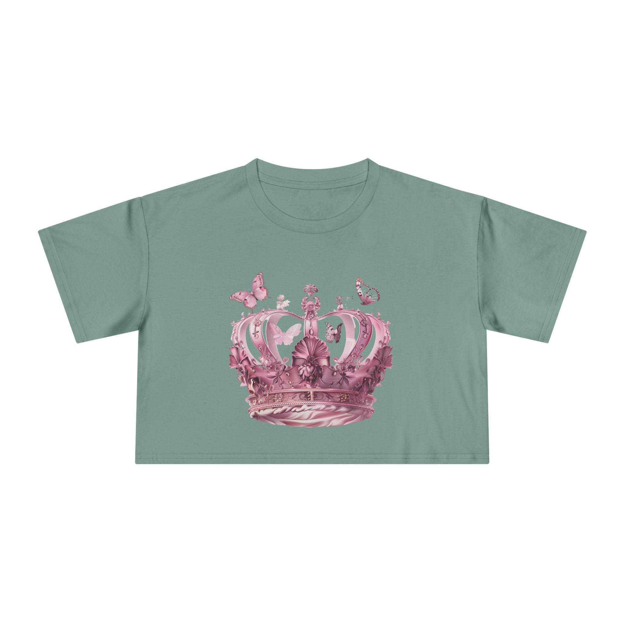 Petal & Crown eco crop shirt in green with detailed pink crown and butterfly design by Printify