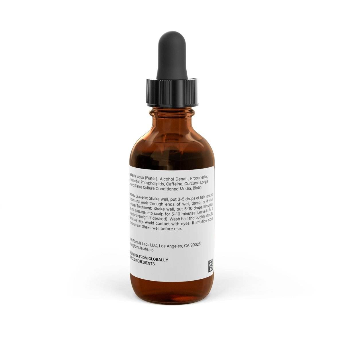 Amber glass dropper bottle of Rapunzel hair tonic for growth by Printify showing ingredient label on white background