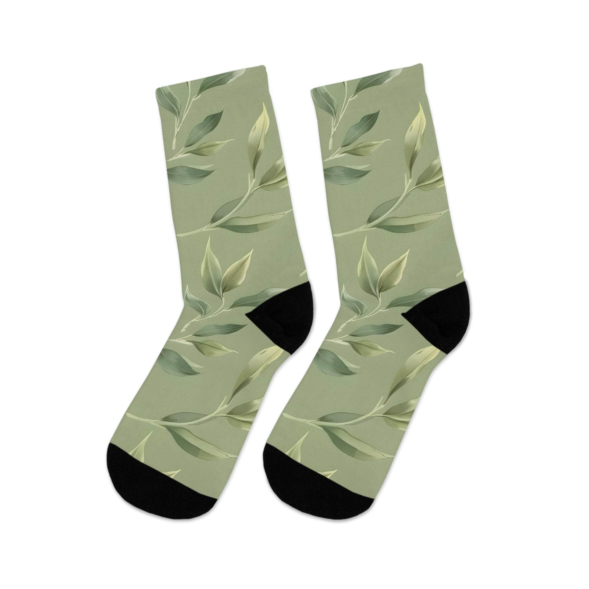 Printify recycled poly socks with green leaf pattern and black heel and toe accents
