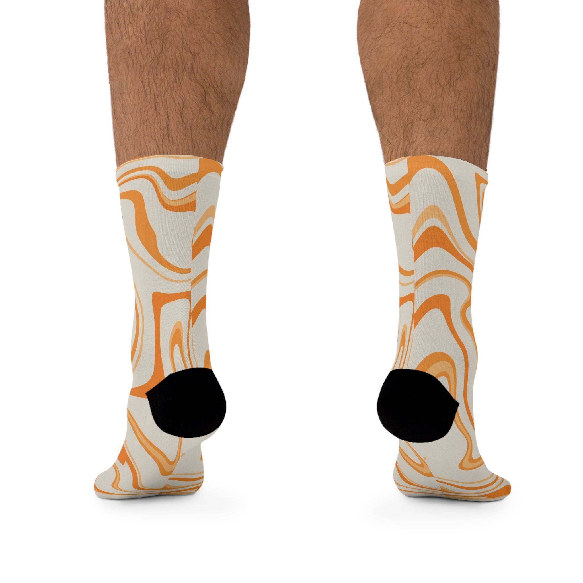 Printify recycled poly socks in beige with orange abstract swirl pattern and black heels