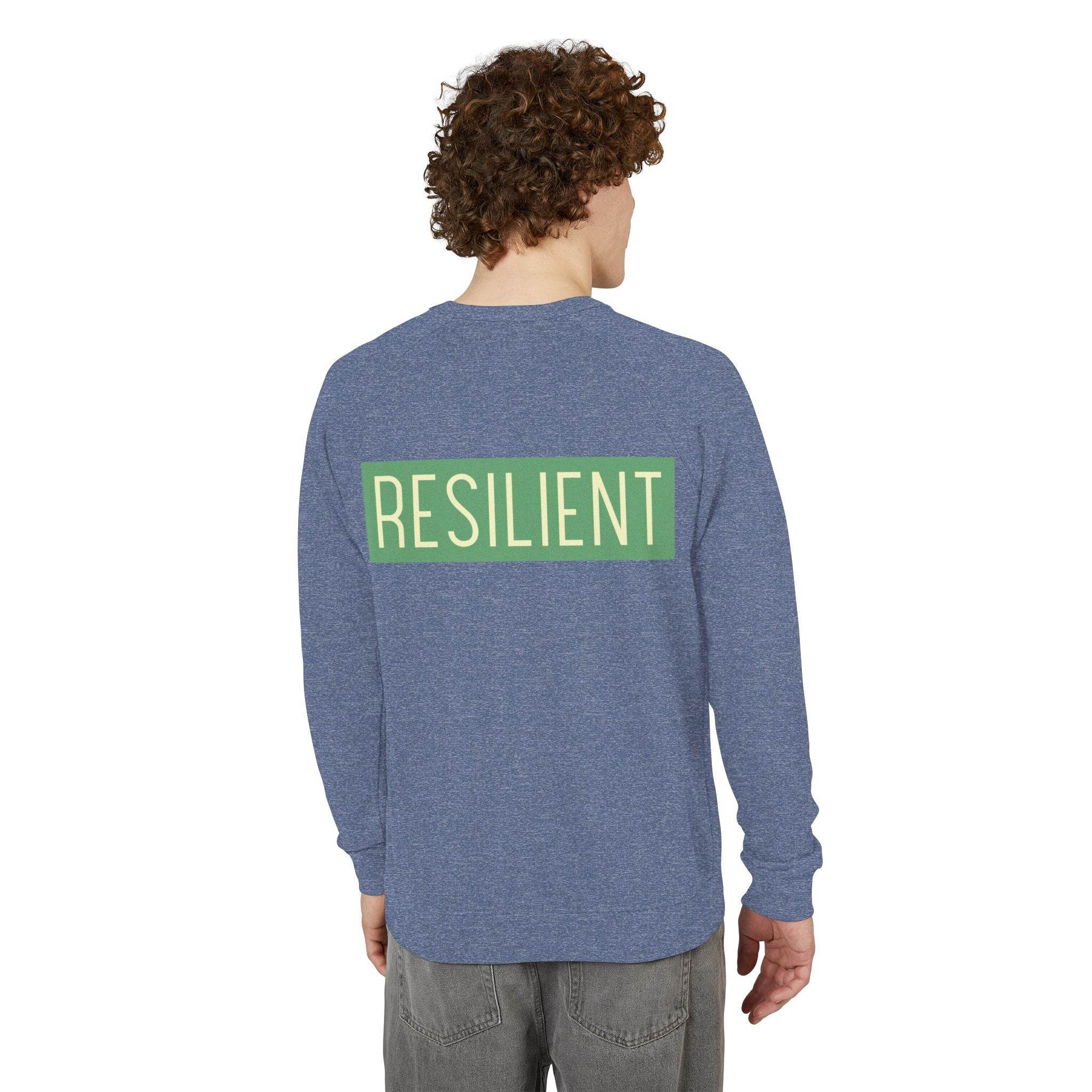 Printify eco-friendly crewneck sweatshirt in blue with resilient graphic on the back worn by a male model