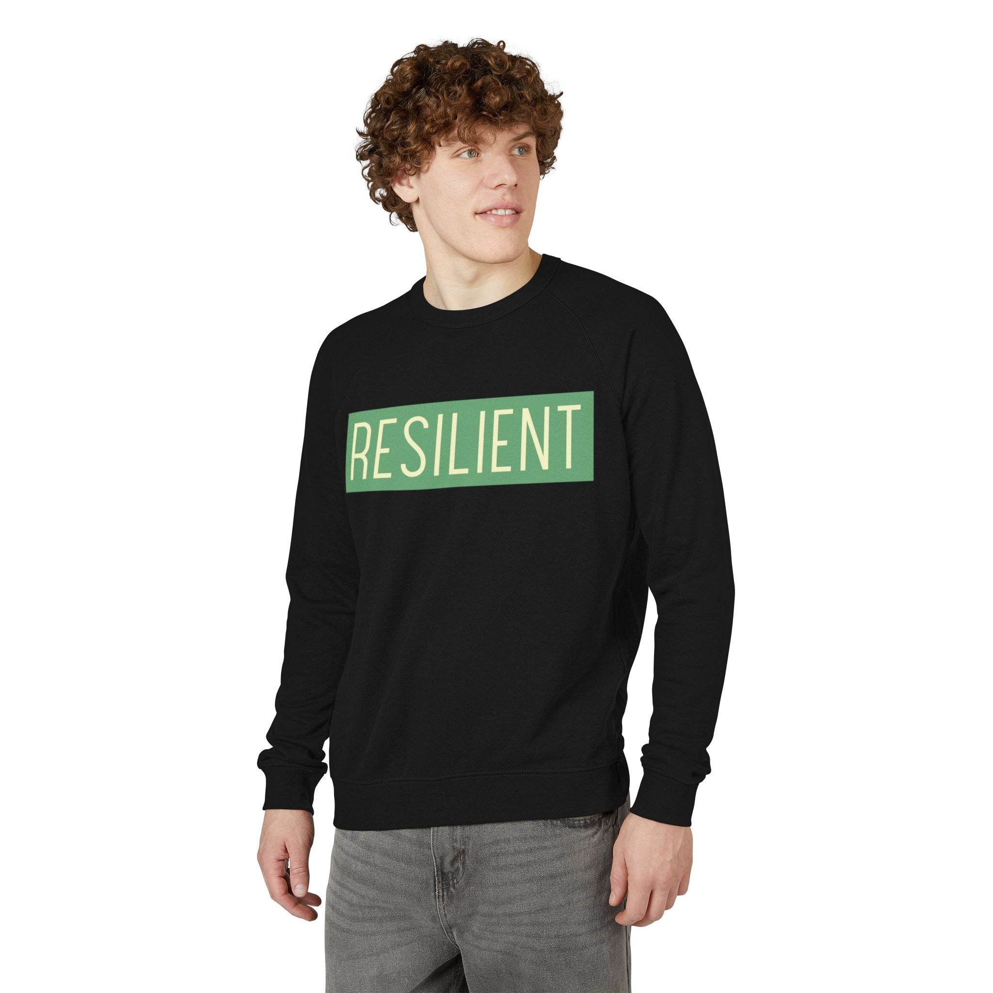 Printify eco-friendly crewneck sweatshirt in black with resilient graphic worn by male model