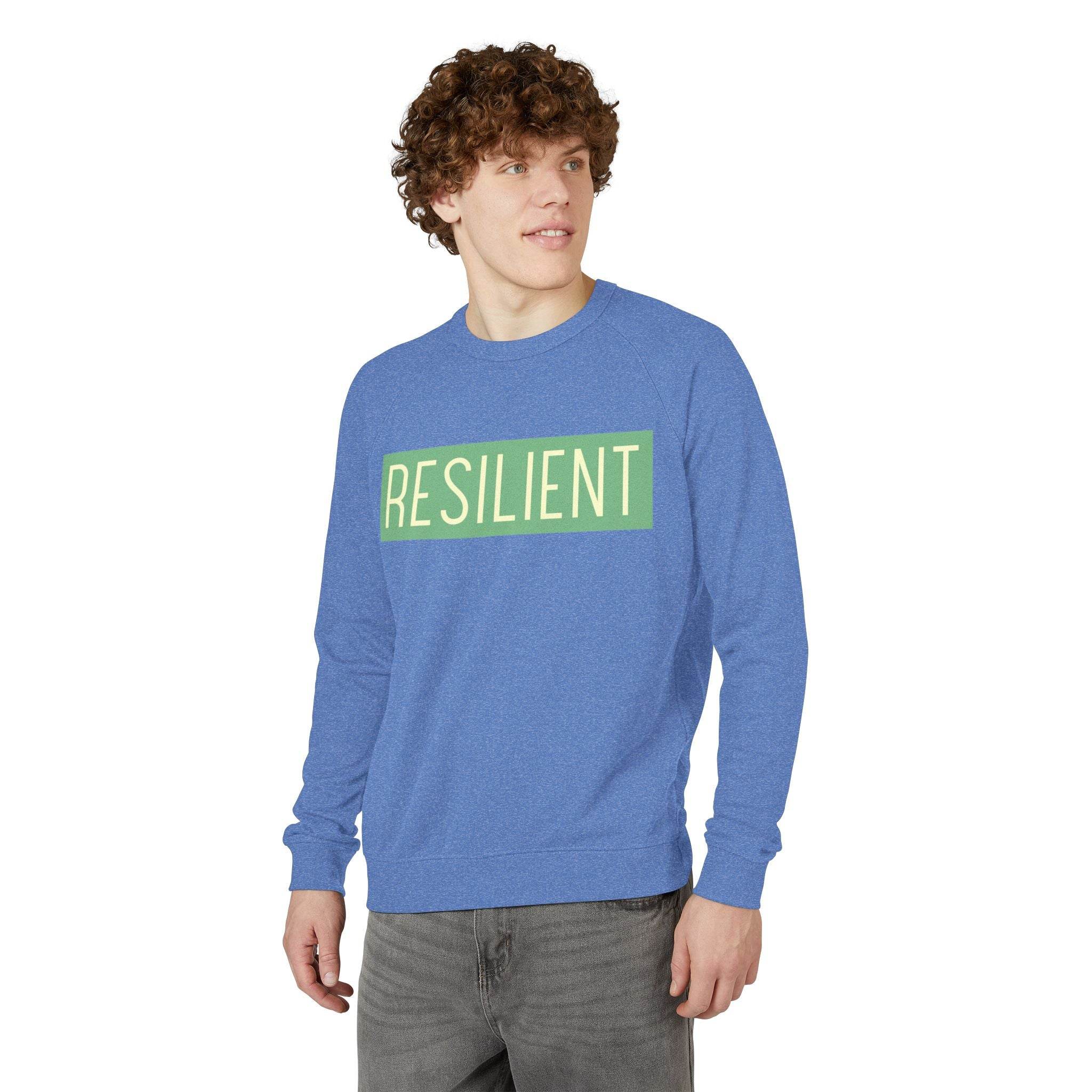 Printify eco-friendly crewneck sweatshirt in blue with resilient text design worn by a male model
