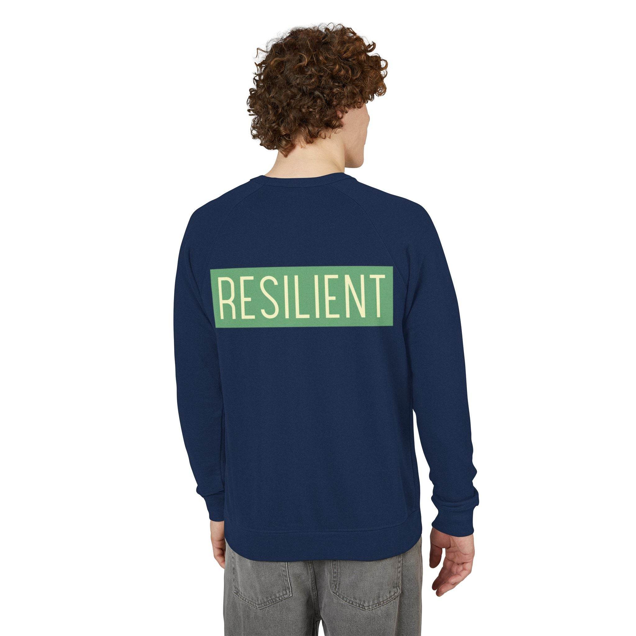 Printify navy eco-friendly crewneck sweatshirt with resilient text design on back worn by male model