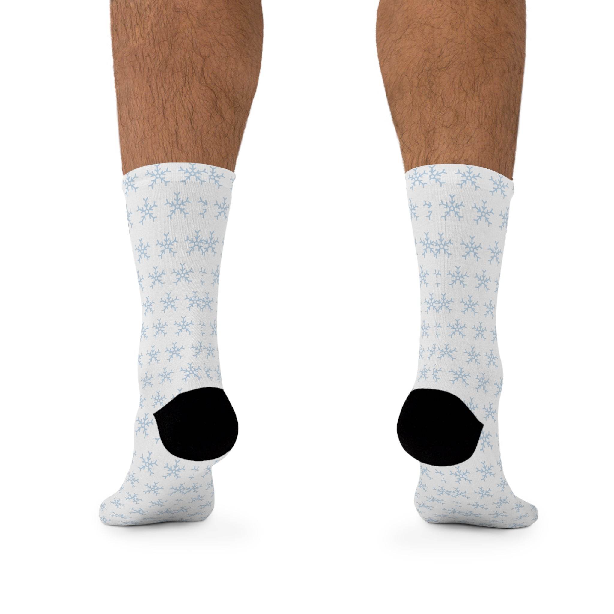 Printify sustainable recycled poly socks with white background and blue snowflake pattern on model feet