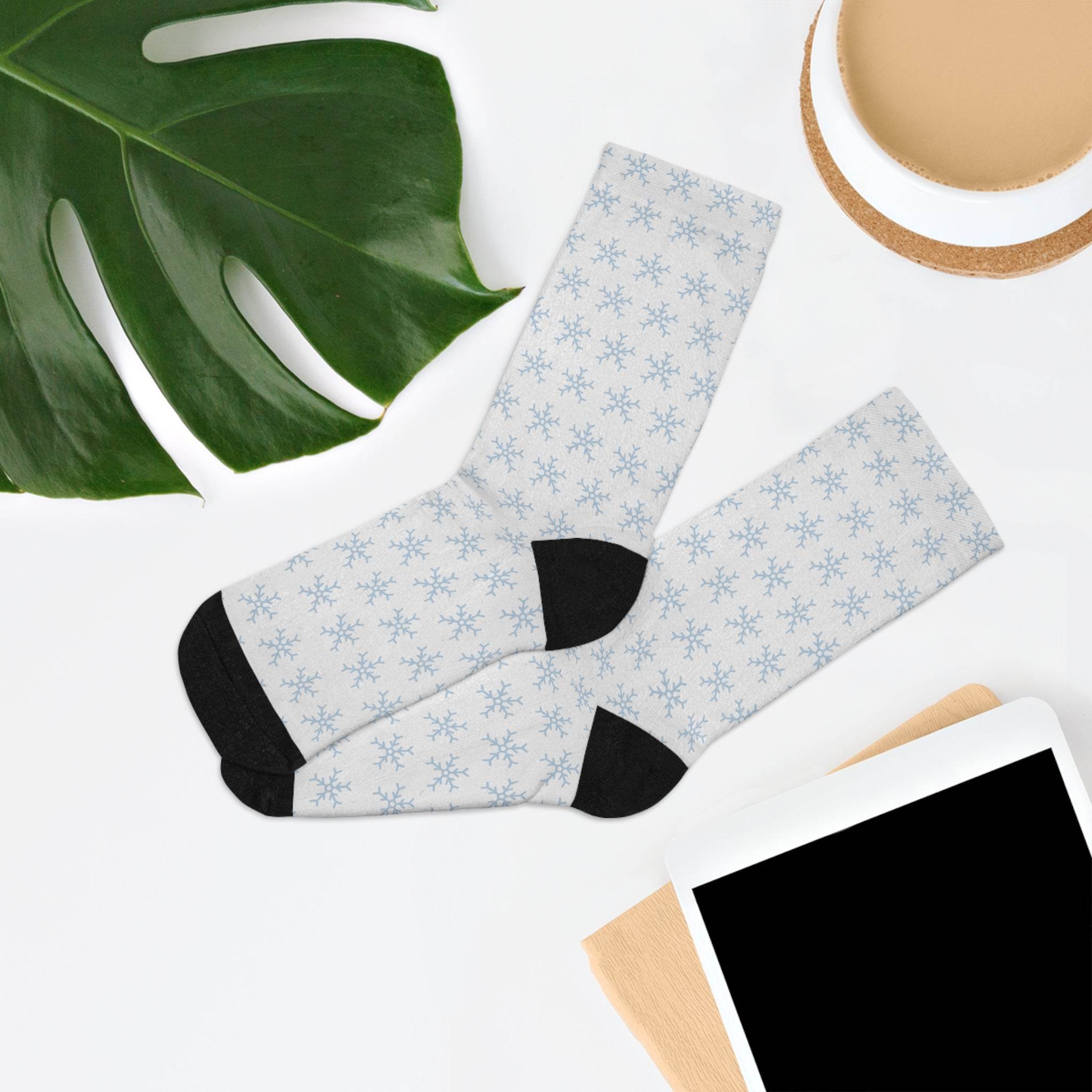 Printify sustainable recycled poly socks with blue snowflake pattern and black heel and toe sections