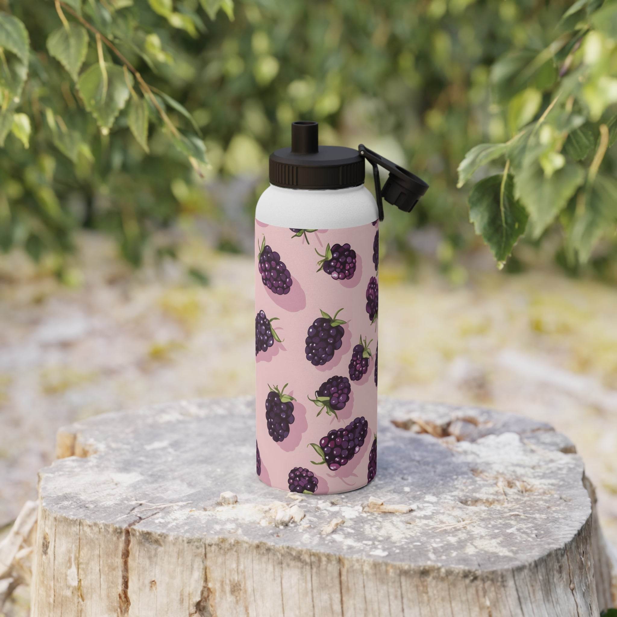 Printify stainless steel eco water bottle with blackberry design on pink background outdoors