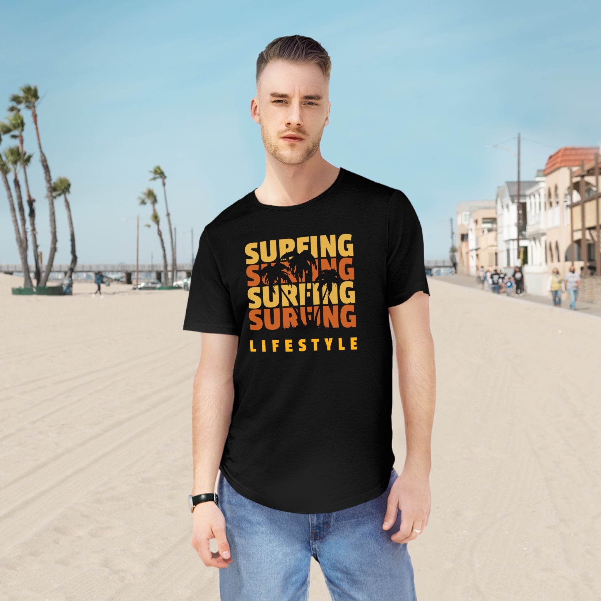 Printify black eco friendly surfing t shirt with orange surfing lifestyle graphic worn on beach