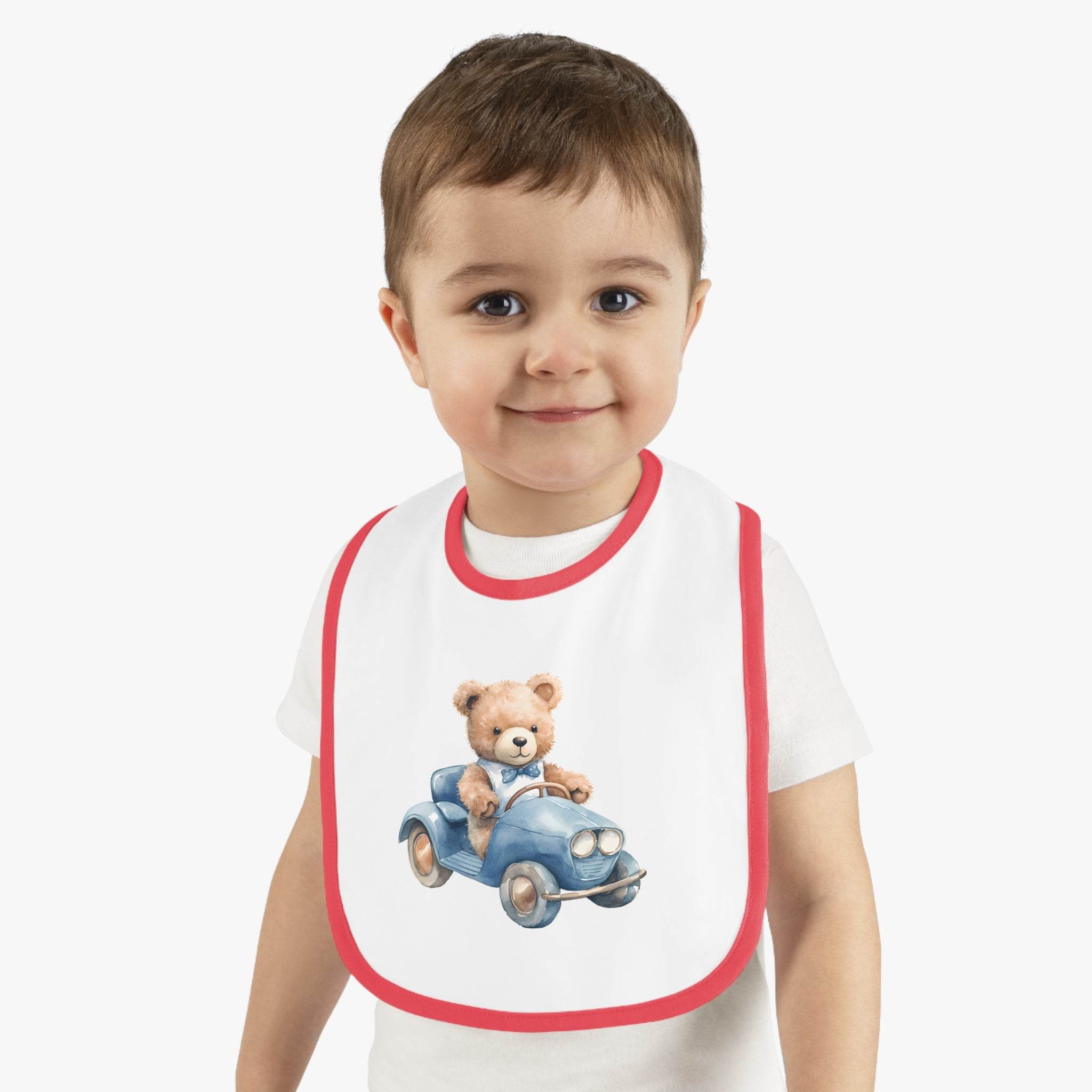 Printify sustainable baby bib with red trim featuring teddy bear driving a blue car design