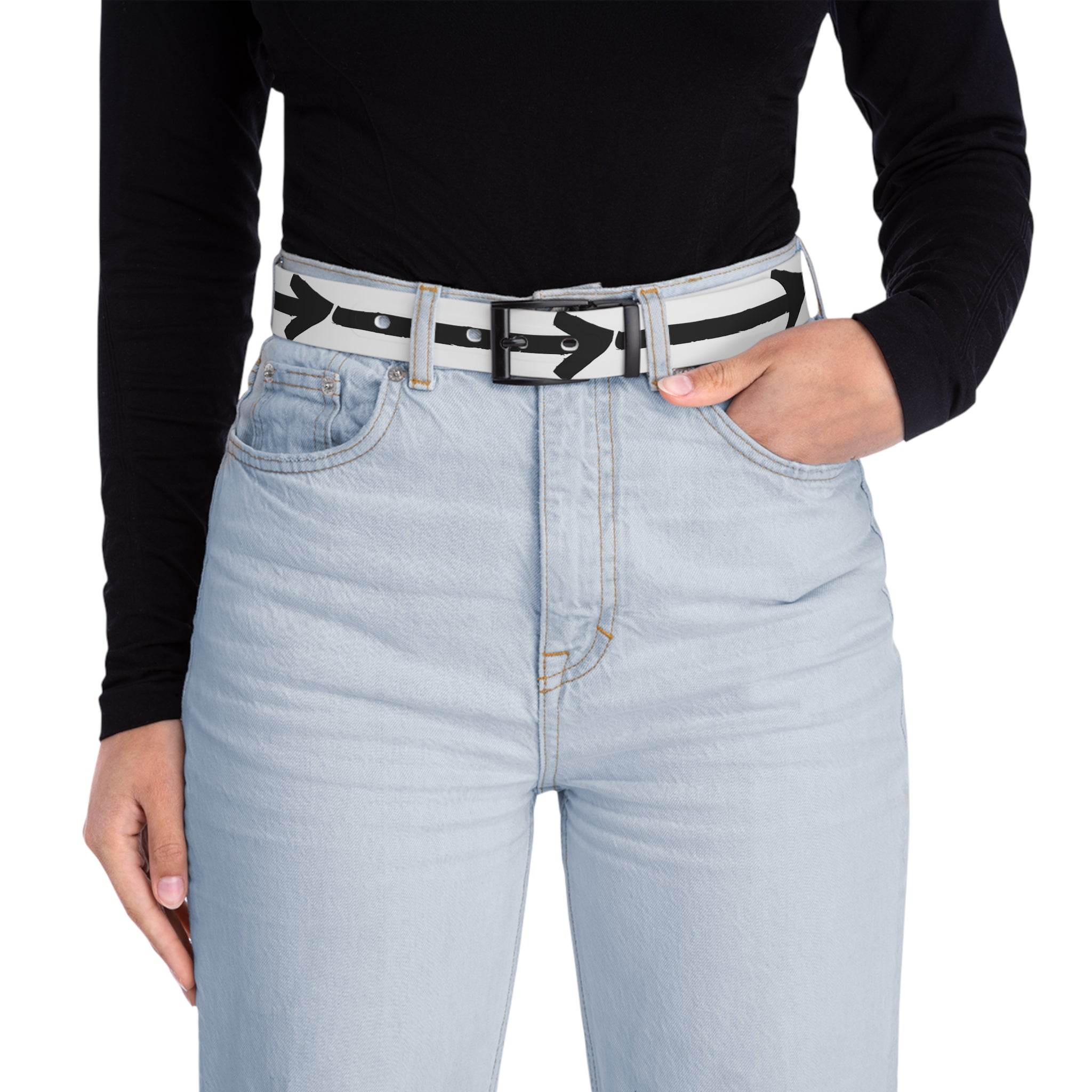 Person wearing light blue jeans and a sustainable direction belt with black arrow design