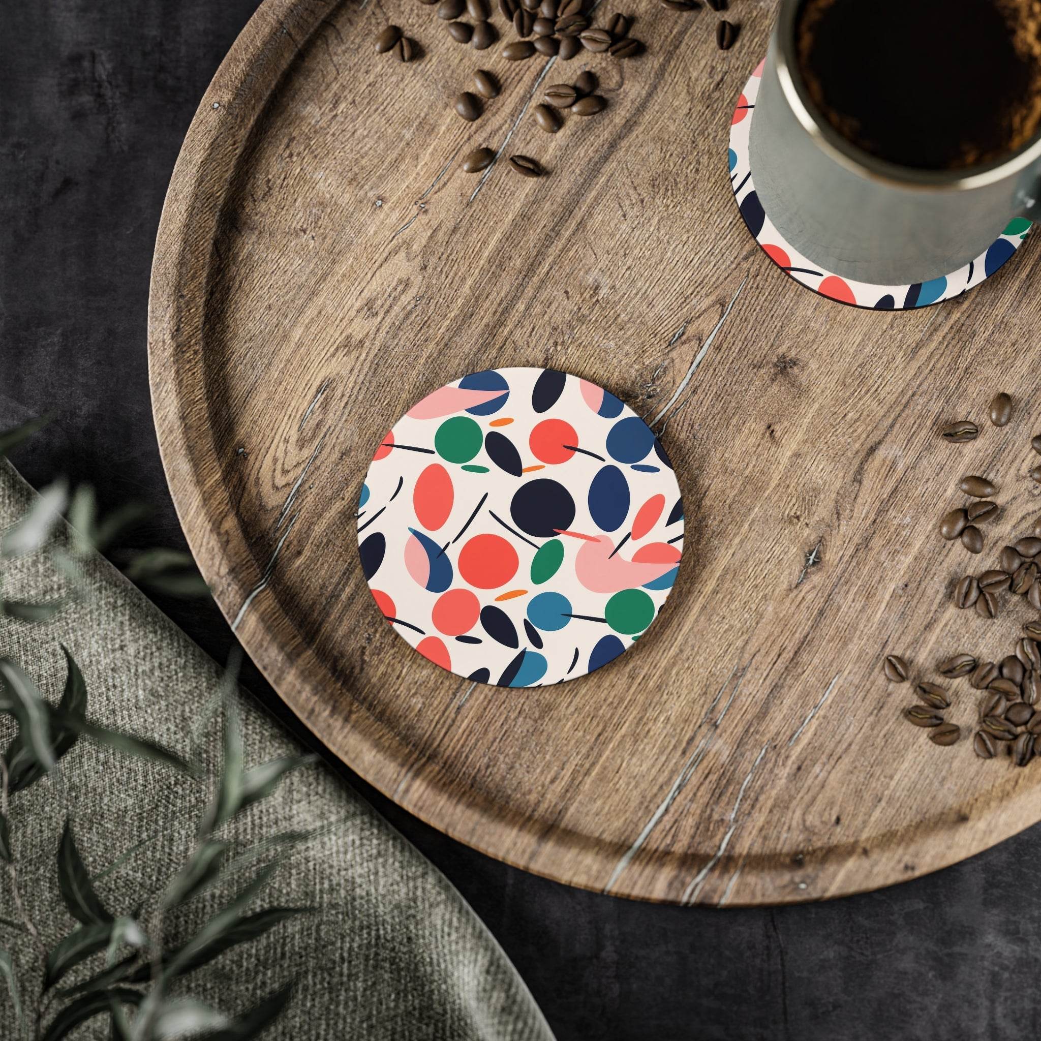 Printify sustainable drink coasters with colorful leaf pattern on wooden tray holding coffee cup