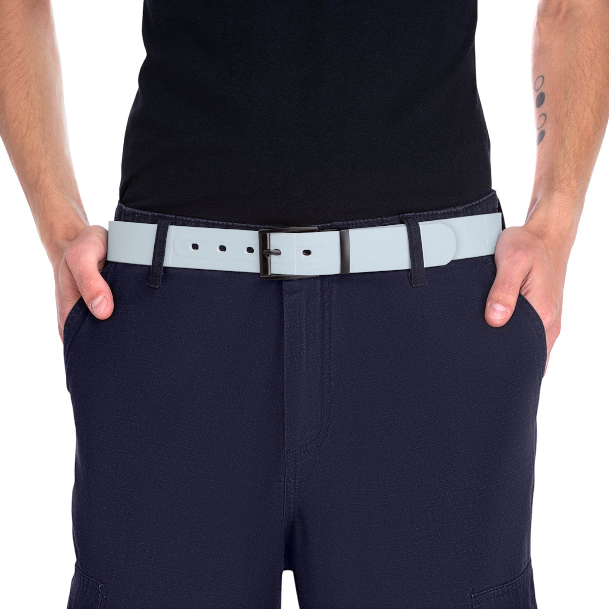 Close-up of a person wearing a white sustainable fashion belt with black buckle from Printify over dark pants