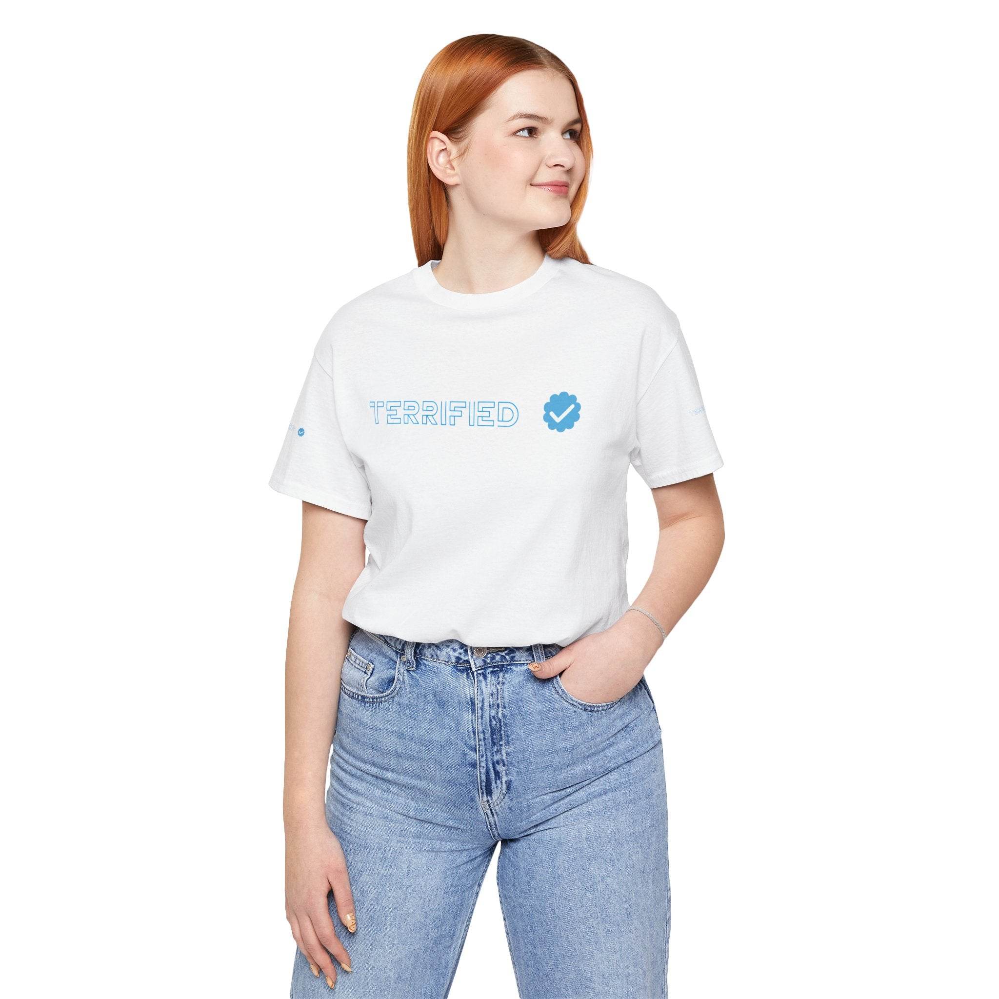 White Printify T-shirt with blue TERRIFIED text and checkmark logo worn by woman with red hair