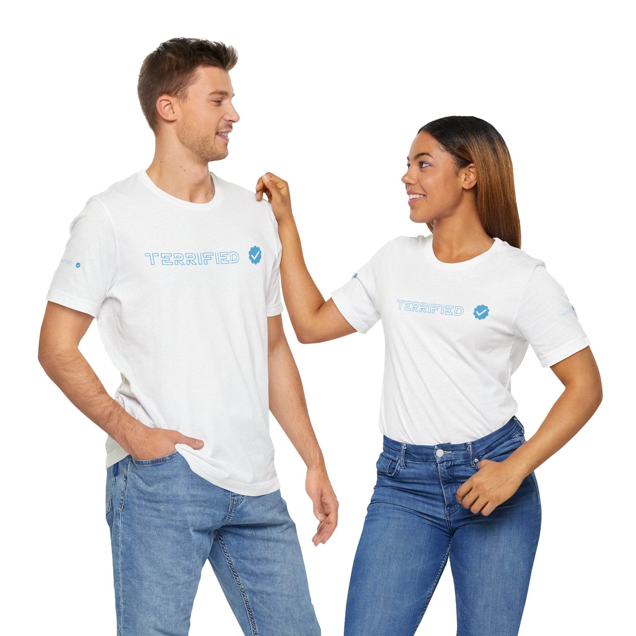 Man and woman wearing white Printify T-shirts with blue text and logo, paired with blue jeans