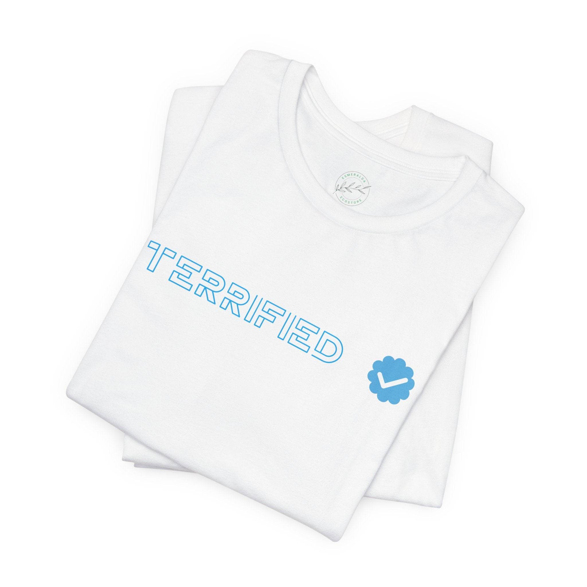 White Printify T-shirt with blue terrified text and checkmark design folded on white background