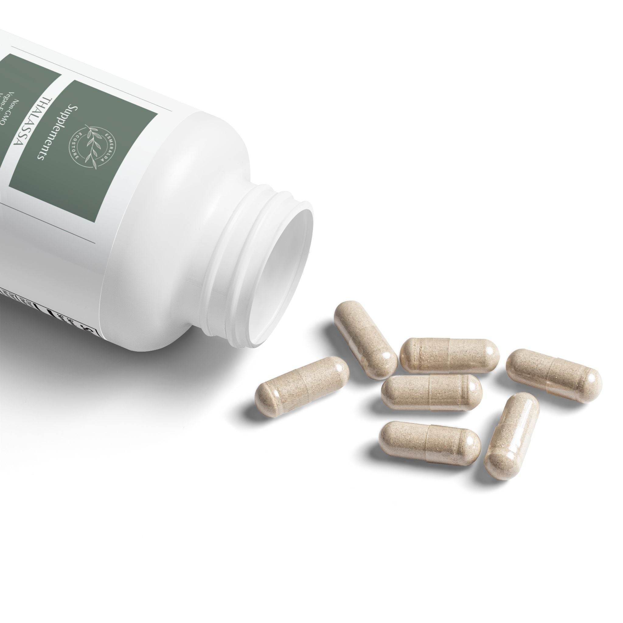 White bottle of Printify Thalassa Sea Moss Capsules with several capsules spilled on white surface
