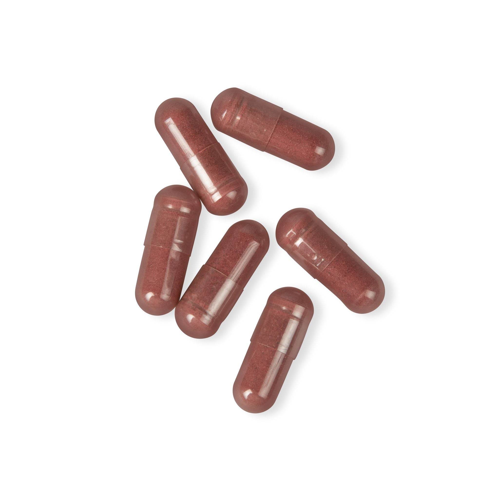 Six brown capsules of vegan performance booster supplement by Printify on white background