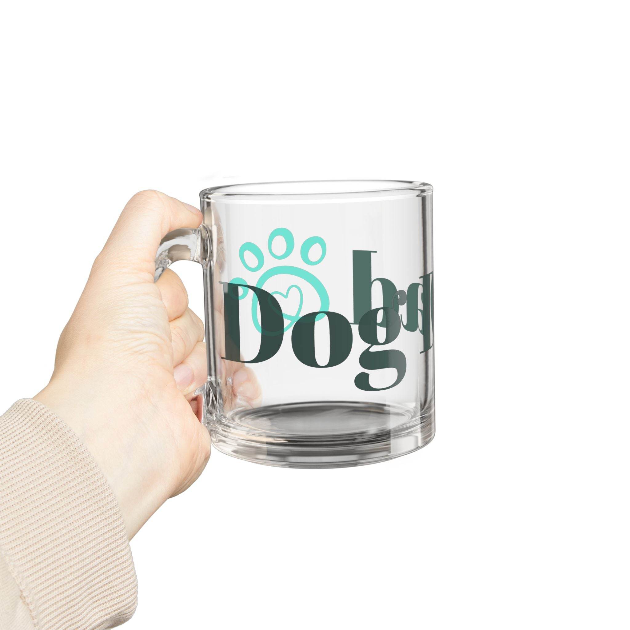 Printify eco-friendly dog dad mug made of clear glass held in hand with teal paw print design
