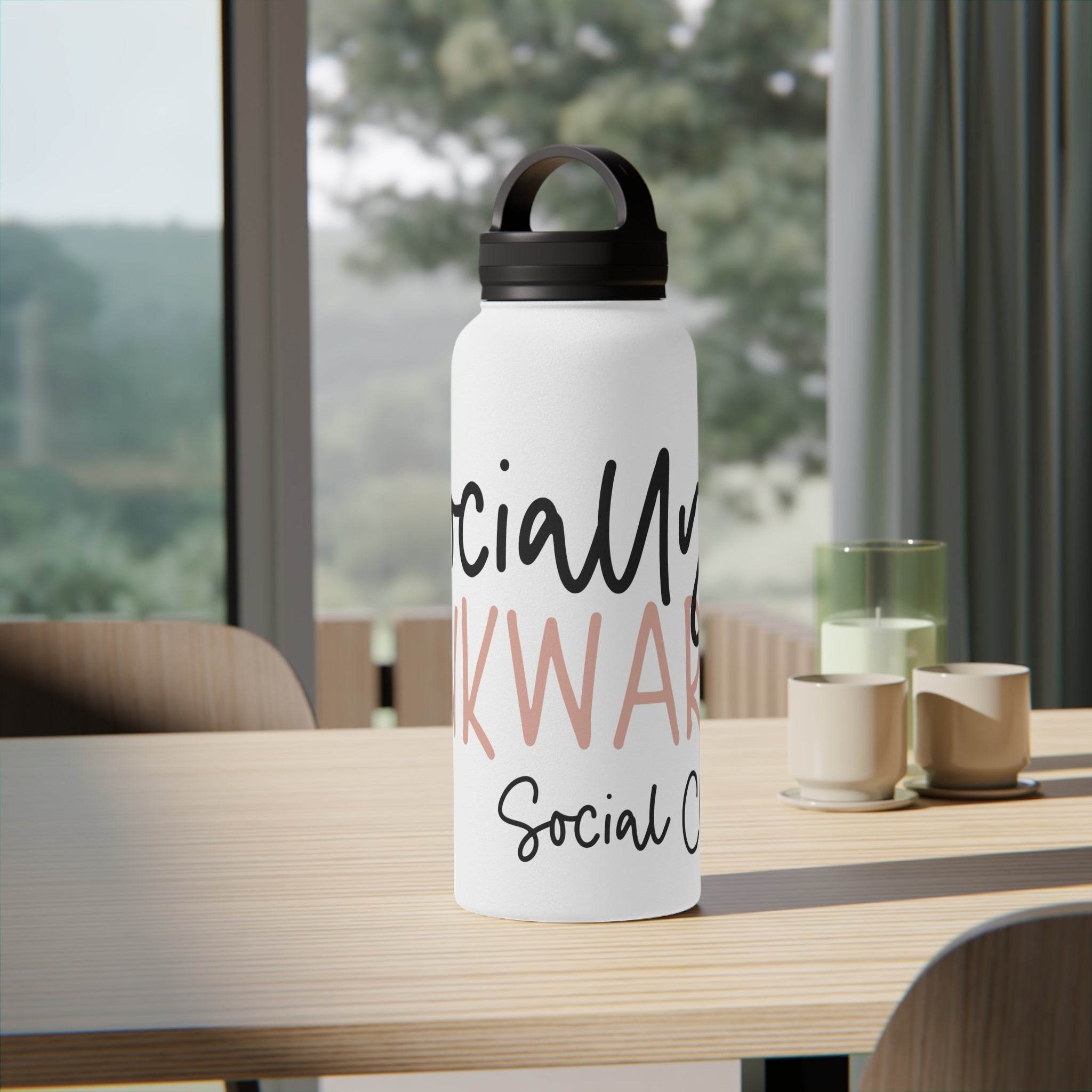 Printify eco-friendly stainless steel water bottle with black lid on wooden table indoors