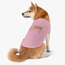 Shiba Inu wearing a pink eco-friendly pet tank top printed with playful If it hits the floor it belongs to me design