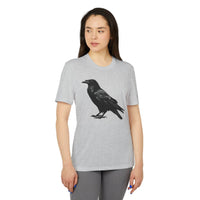 Printify eco-friendly Adidas sport t-shirt in gray with black crow graphic worn by woman