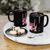 Printify black eco-friendly mom coffee mug with pink floral design filled with steaming coffee