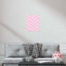 Pink checkered pattern sustainable uncoated posters hanging above gray sofa in modern living room