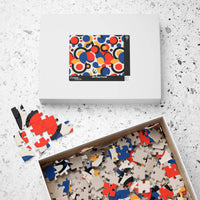 Printify colorful eco puzzle with abstract red blue and beige pieces in open box and white packaging