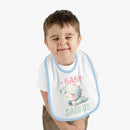 Printify dinosaur print baby bib with cute sleeping dinosaur and pastel colors worn by toddler