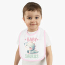 Printify dinosaur print baby bib with cute sleeping dinosaur and pink border worn by toddler