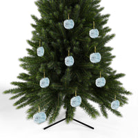 Christmas tree decorated with multiple light blue dragonfly christmas ornament by Printify