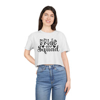 Smiling model wearing eco-friendly bride squad crop top in white with black script print and high waist jeans