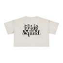 Printify eco-friendly bride squad crop top cream cropped T shirt back view with black Bride Squad script heart and leaf design