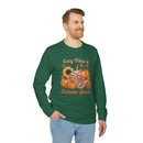 Printify green crewneck with pumpkin sunflower and hot cocoa design worn by male model eco-friendly autumn sweatshirt